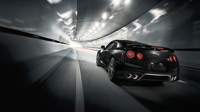 2023 Nissan GT-R seen from behind driving through a tunnel | Coral Springs Nissan in Coral Springs FL