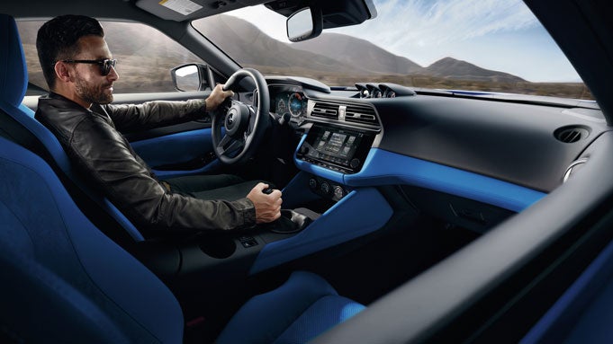 2024 Nissan Z person in cockpit with blue interior